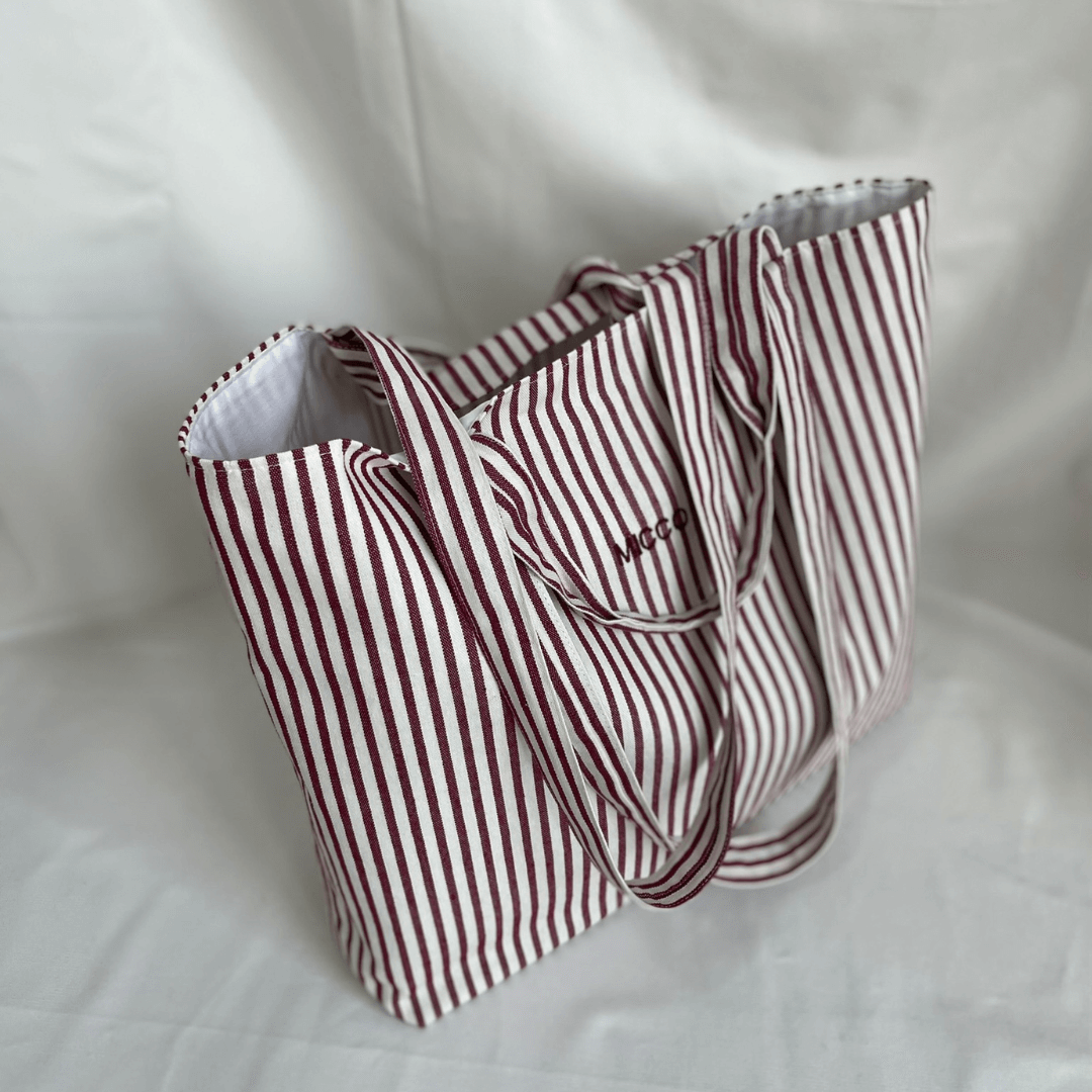Bolsa de tela grande con rayas, forrada y asas largas