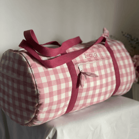 Bolsa de viaje rosa