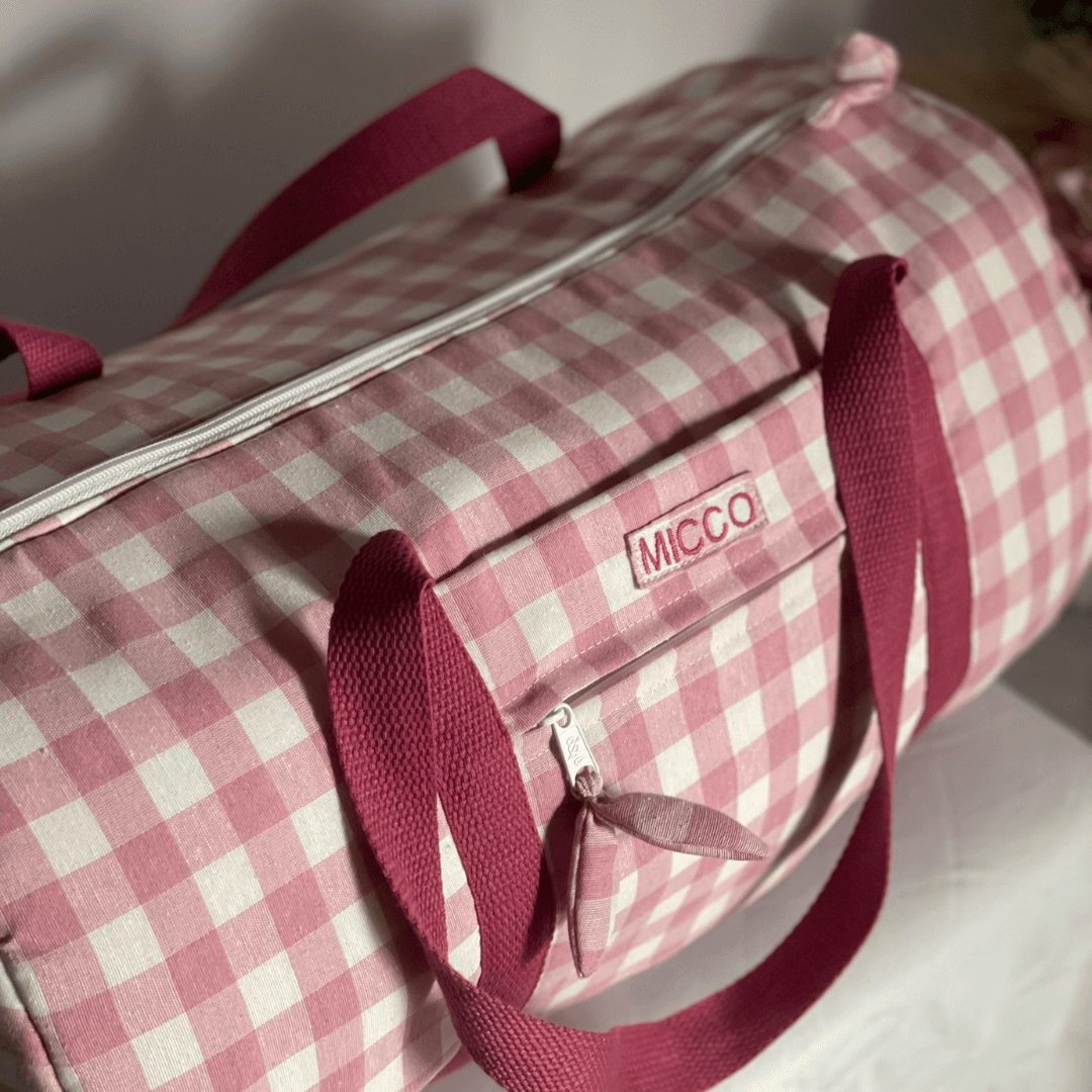 Bolsa de viaje rosa