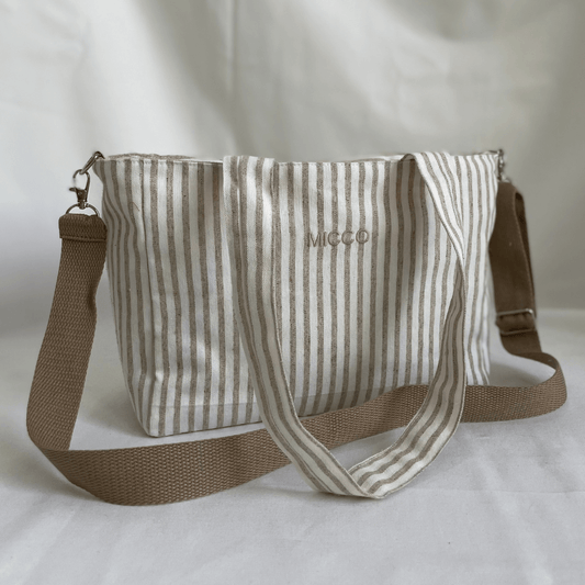 Bolso pequeño de rayas camel y beige, con asa cruzada desmontable y forro interior