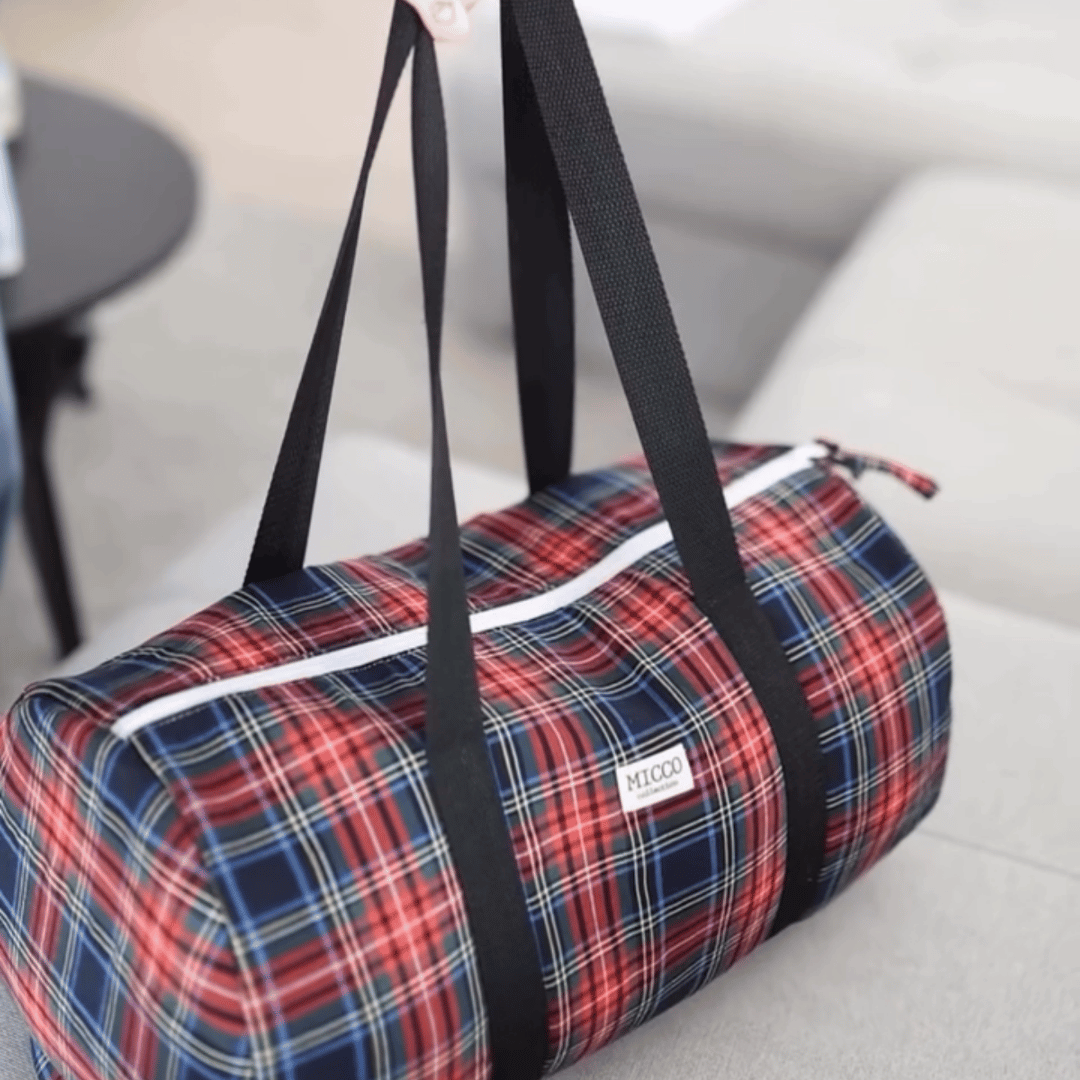 Bolsa de Viaje Acolchada Redonda en Tejido Tartán – Ligera y Espaciosa